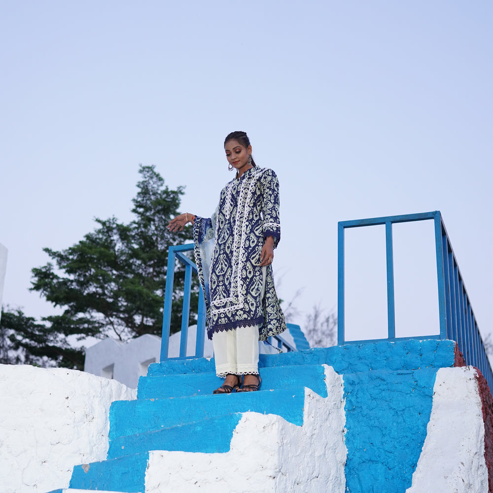 
                      
                        Blue and White Cotton Printed Suit CS 106
                      
                    